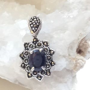 Elegant Silver and Black Stone Pendant